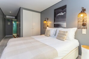 Deluxe Double or Twin Room, Non Smoking, Beach View | In-room safe, blackout drapes, iron/ironing board, rollaway beds