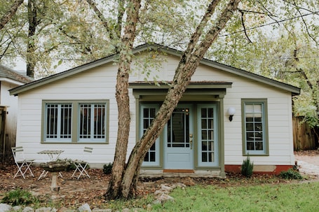 Exterior. Charming midtown cottage with central air and driveway parking, great location