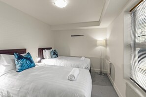 2 bedrooms, desk, iron/ironing board, travel crib