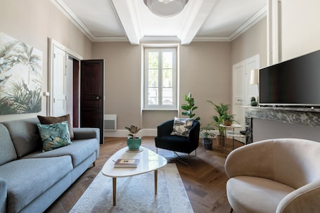 Luxury Suite, City View | Desk, laptop workspace, blackout drapes, iron/ironing board