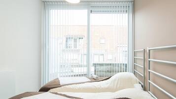 Apartamento | 3 dormitorios y tabla de planchar con plancha