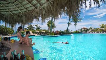 14 outdoor pools, open 8:00 AM to 6:00 PM, pool umbrellas