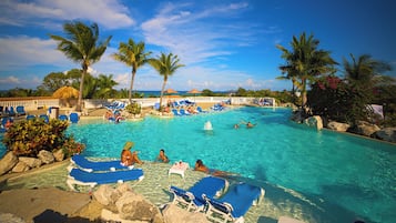 14 outdoor pools, open 8:00 AM to 6:00 PM, pool umbrellas