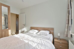 Appartement | 2 chambres, ameublement unique, fer et planche à repasser