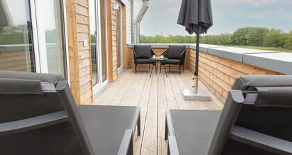 Meerzeit Tossens – Urlaub mit Hund. Dachterrasse. Deichblick.