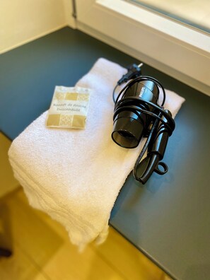 Shower, eco-friendly toiletries, hair dryer, bidet