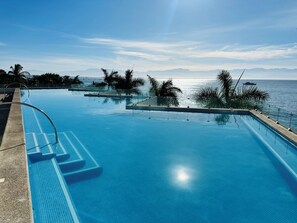 Outdoor pool - 3-bedroom condo in La  Cruz de Huanacaxtle, AC, WiFi, Fitness, Beachfront ! (Cruz de Huanacaxtle)