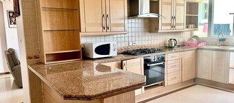 Spacious 3-bedroom apartment with AC, WiFi in fantastic Dar es Salaam