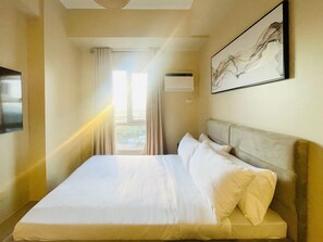 Iron/ironing board, bed sheets - Modern Studio at Avida Towers Atria (Iloilo City)