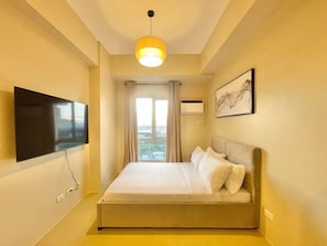 Iron/ironing board, bed sheets - Modern Studio at Avida Towers Atria (Iloilo City)