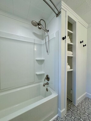 Hair dryer, towels, soap, shampoo