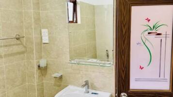 Hair dryer, towels, soap, toilet paper