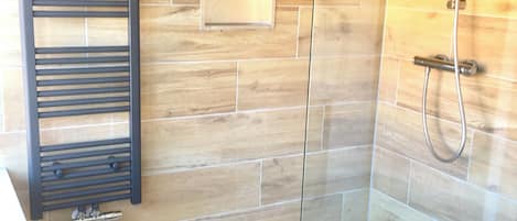 Shower, free toiletries, hair dryer, towels