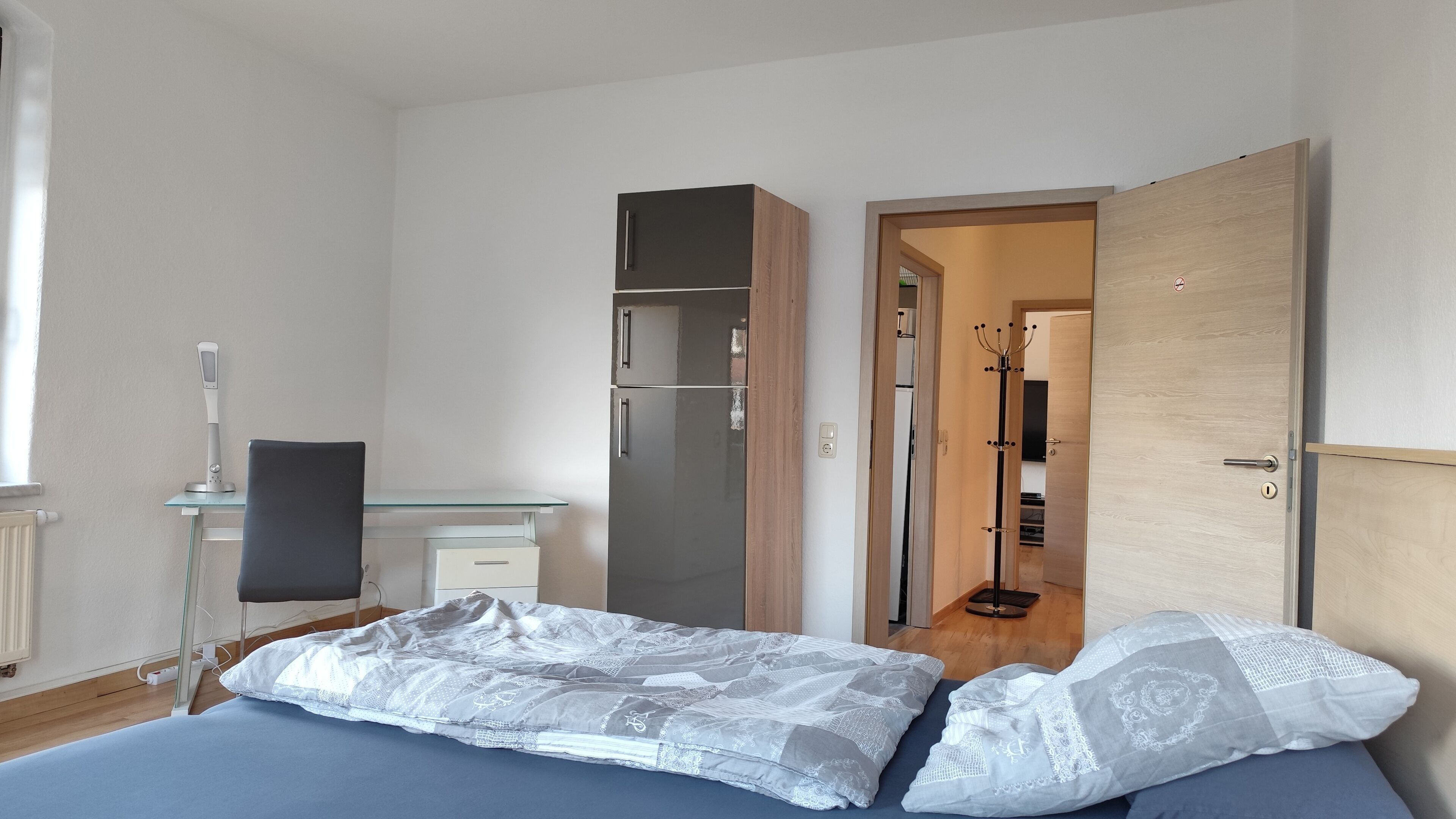 1 bedroom, desk, iron/ironing board, travel crib