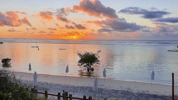 On the beach, white sand