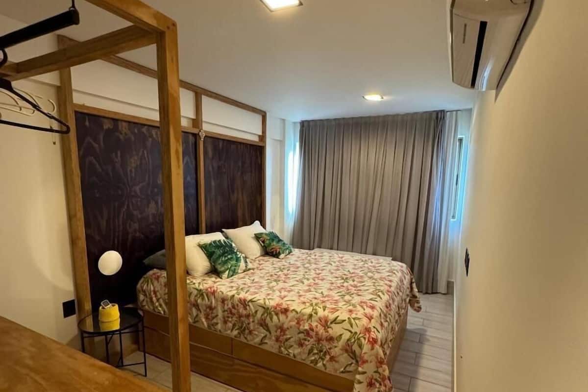 Appartement exécutif | Draps en coton égyptien, literie de qualité, ameublement unique