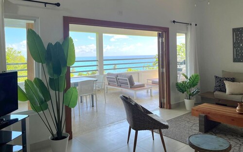 Stunning ocean views, spacious, open-concept, modern luxury & tropical charm.