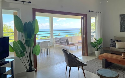 Stunning ocean views, spacious, open-concept, modern luxury & tropical charm.