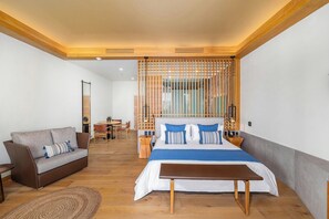 ห้องจูเนียร์สวีท, เตียงคิงไซส์ 1 เตียง | เครื่องนอนป้องกันสารก่อภูมิแพ้, มินิบาร์, ตู้นิรภัยในห้องพัก
