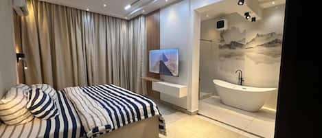 Family Apartment, Balcony, City View | 2 bedrooms, desk, laptop workspace, blackout drapes