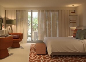 A modern hotel room with a large bed, a sofa, a dining table, and a view through the window. - Kimpton Atlantico Algarve (Albufeira)