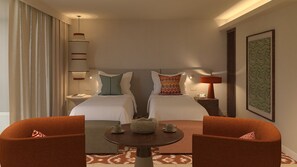 A hotel room with two beds, a round table, and two armchairs. - Kimpton Atlantico Algarve (Albufeira)