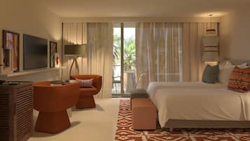 Habitación de hotel con cama, dos sillones, escritorio, televisor y balcón con cortinas.
