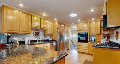 Cozy family-friendly house with a dedicated workspace and gas grill