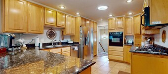 Cozy family-friendly house with a dedicated workspace and gas grill