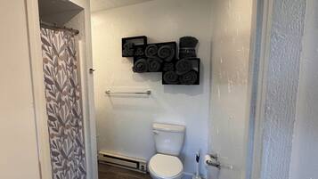 Shower, towels, soap, shampoo