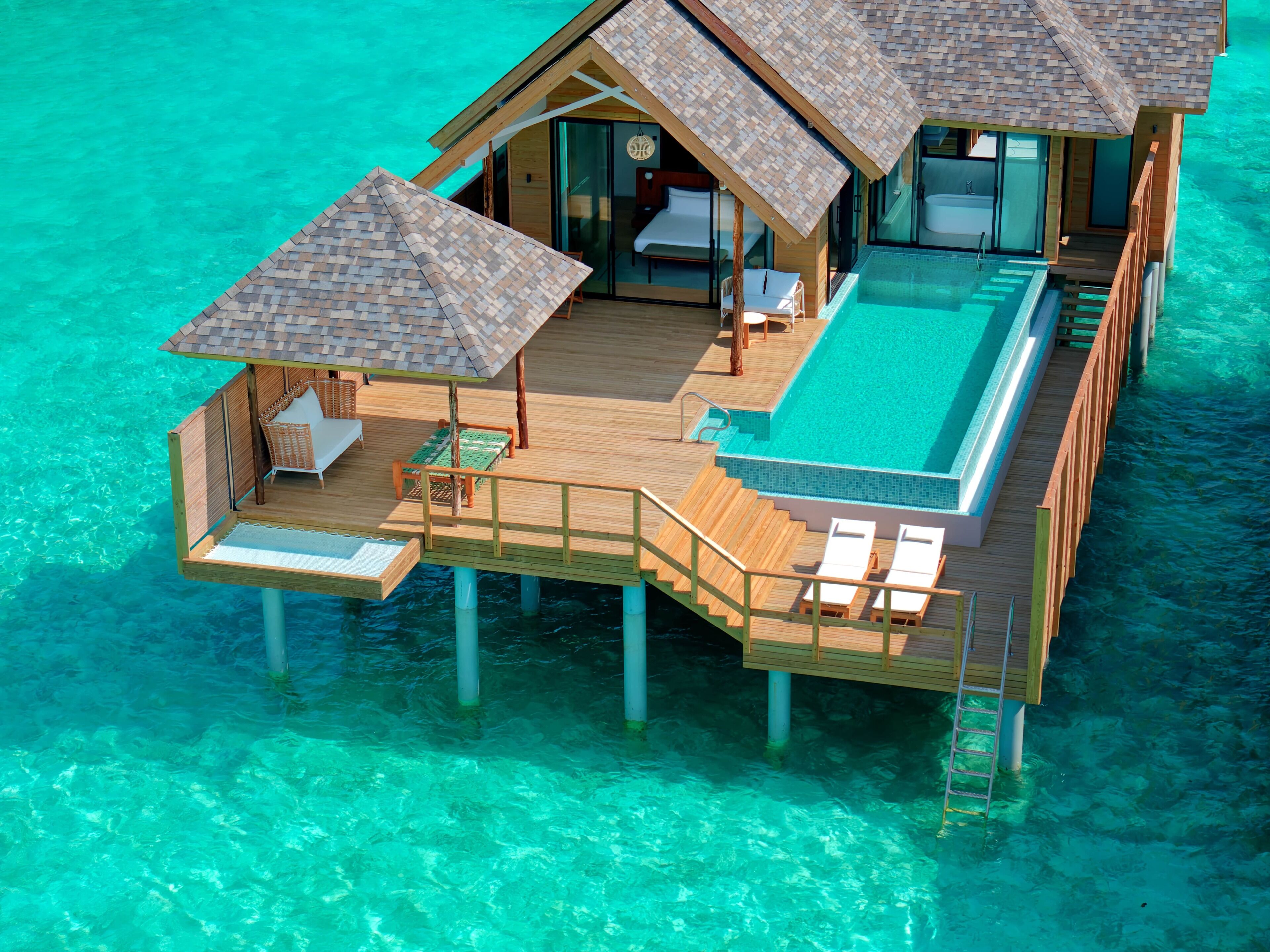 Deluxe Water Pool Villa | In-room safe, desk, laptop workspace, blackout drapes