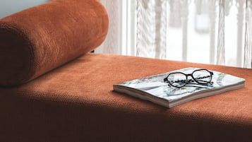 Hypo-allergenic bedding, free minibar items, in-room safe, desk