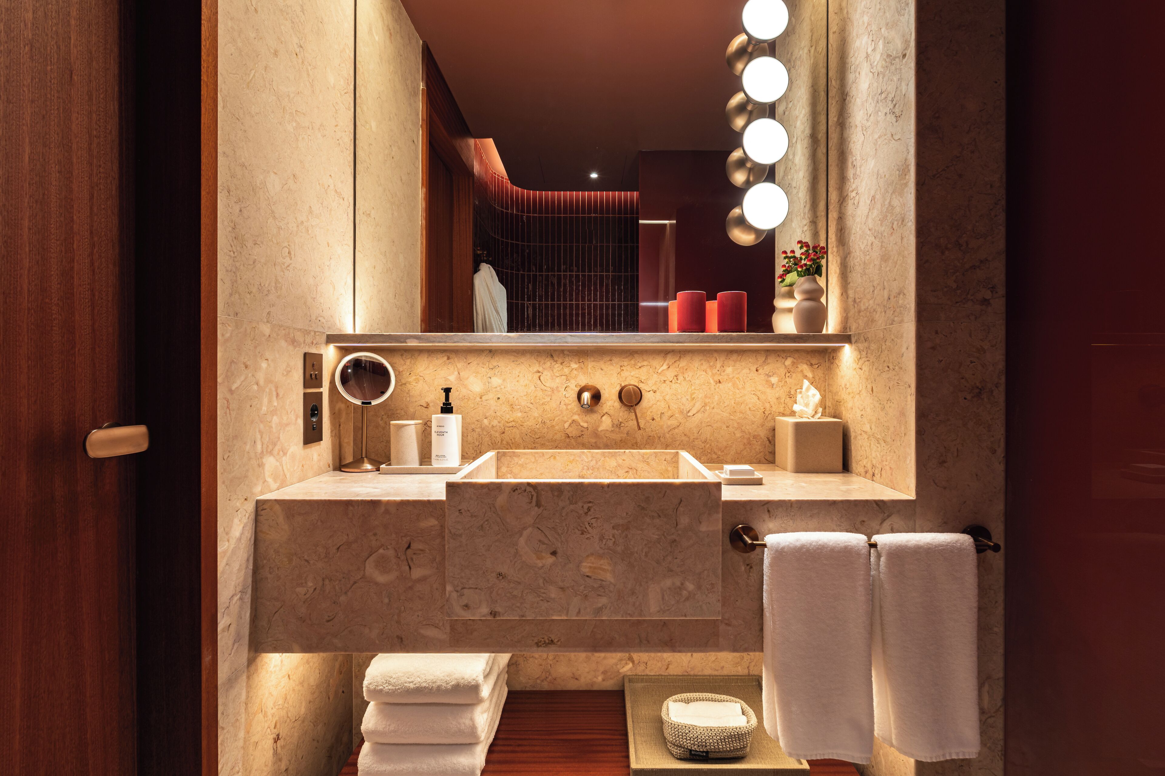 Designer toiletries, hair dryer, bathrobes, slippers