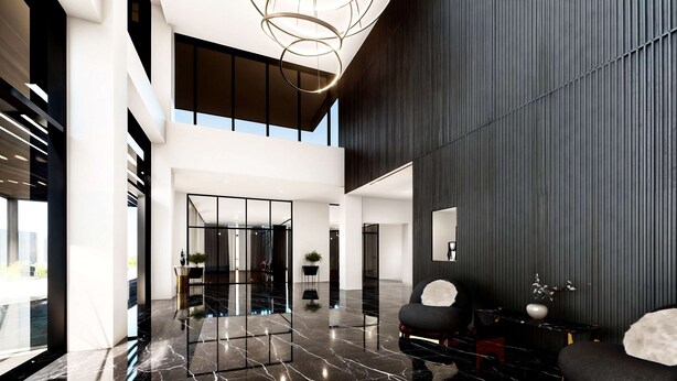 A spacious lobby with a high ceiling, a central glass partition, and a modern chandelier. - Radisson San Luis Potosi Aeropuerto (San Luis Potosi)