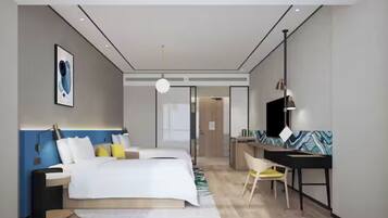 A modern hotel room with a large bed, a desk, and a chair.