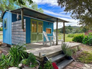 Terrace/patio - WindHorse Shepherds Hut situated on our rustic eco equestrian small holding. (Napier)