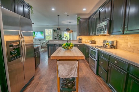 Fridge, microwave, oven, stovetop. Lady Liberty: Park Circle Charm + Modern Home!