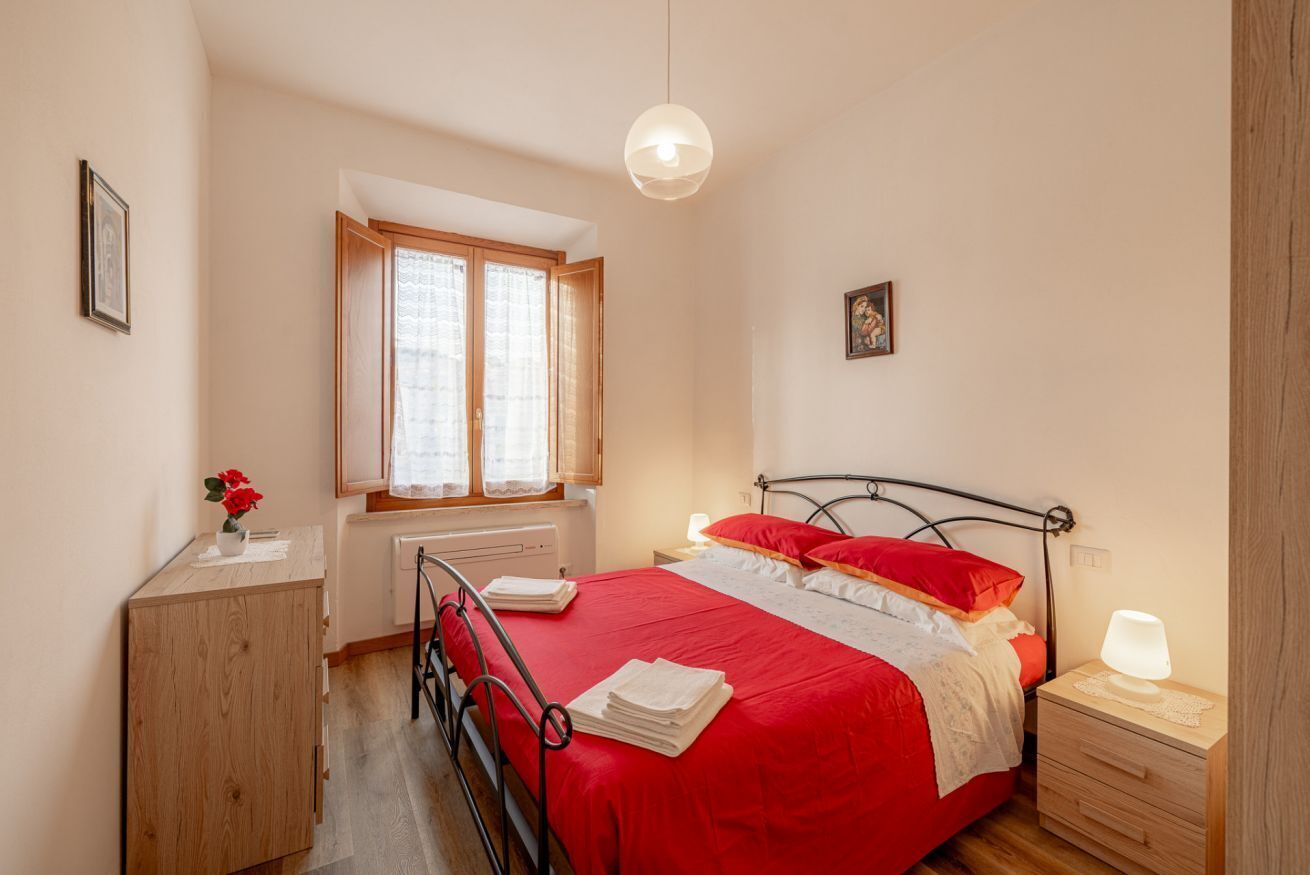 2 slaapkamers, een strijkplank/strijkijzer, beddengoed