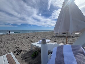 On the beach, beach towels - Brand New Beachfront 2 bed/2.5ba Condo in 5 star resort Palm Beach area (Riviera Beach)