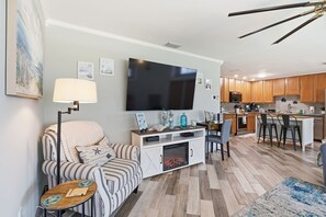 Smart TV, fireplace, table football, books