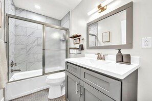 Hair dryer, towels, soap, toilet paper