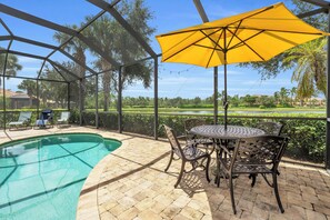 Outdoor dining - 3-bd house in fantastic gated neighborhood, private pool, fitness, laundry (Fort Myers)
