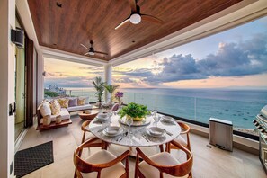 Outdoor dining - Chic Penthouse Ocean Views, Rooftop Pool & Balcony (Puerto Vallarta)
