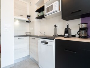 Fridge, microwave, dishwasher, coffee/tea maker