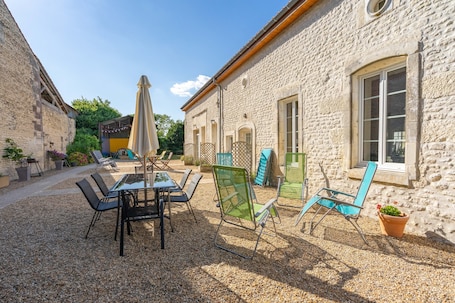Outdoor dining. Holiday Home 'Pâquerette' with Shared Pool, Private Terrace and Wi-Fi