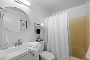 Hair dryer, towels, soap, shampoo