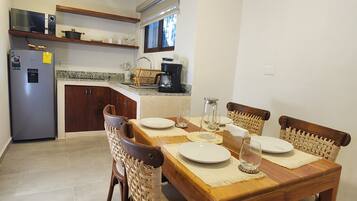 Family Apartment, 2 Double Beds | In-room dining
