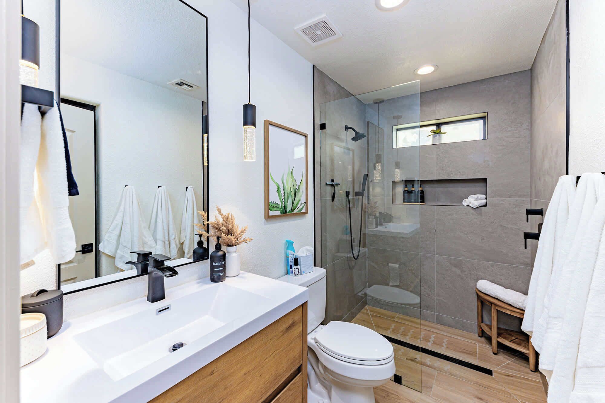 Shower, hair dryer, towels, shampoo