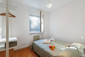 Family Apartment, Multiple Bedrooms (Riva's Garden Home) | 2 bedrooms, free WiFi, bed sheets - Riva's Garden Home (Riva del Garda)