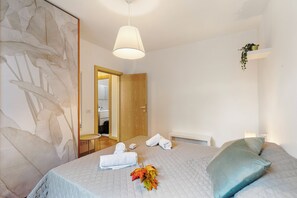Departamento familiar, varias habitaciones (Riva's Garden Home) | 2 habitaciones, wifi gratis y ropa de cama